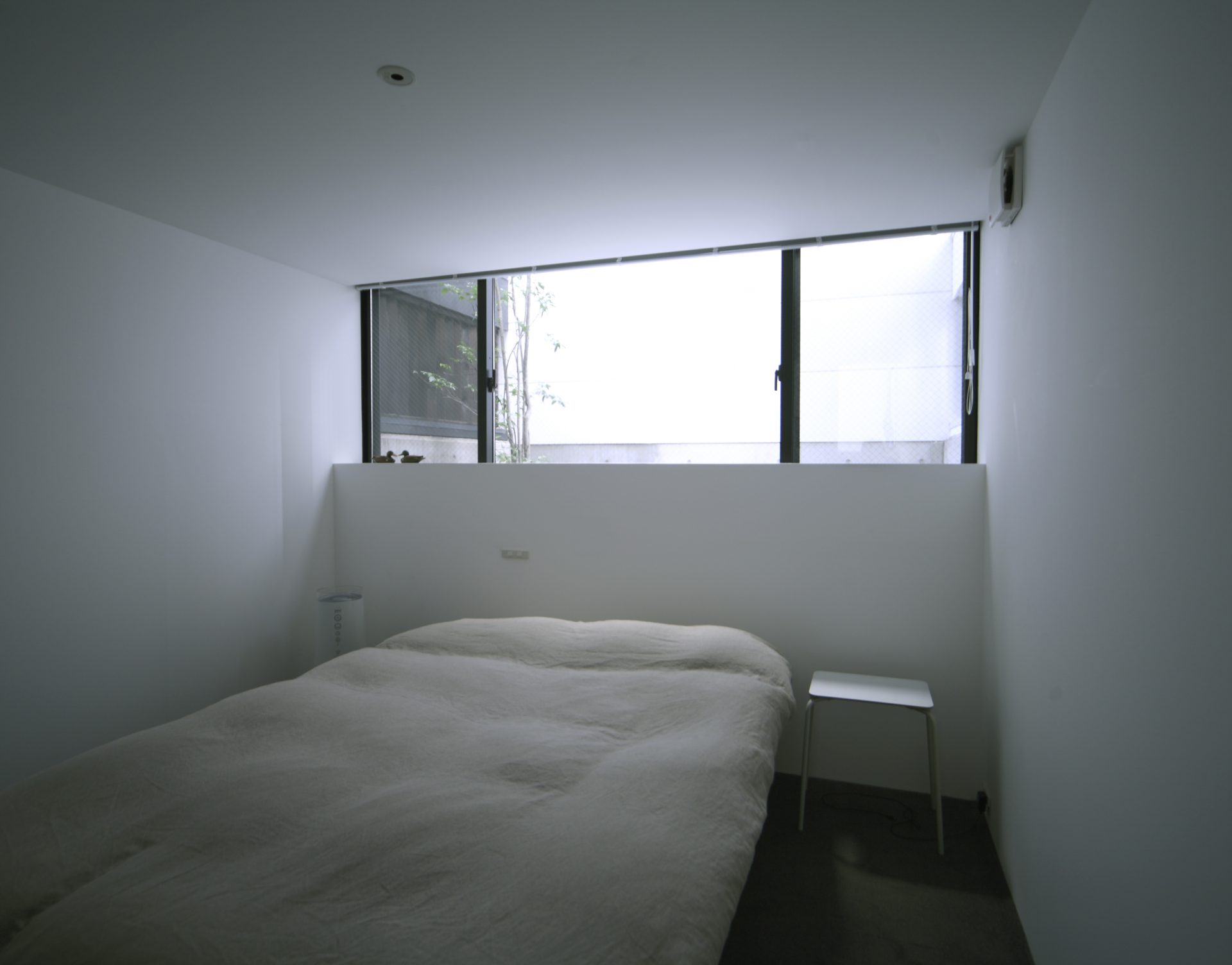 大阪昭和町のガレージハウス｜鉄骨スキップフロアの寝室